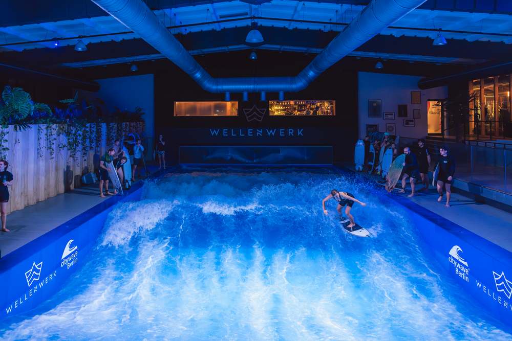 Night session at the company party: illuminated wave